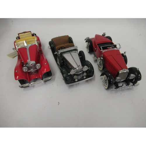 115 - Group of three Franklin Mint diecast model vehicles, 1988 Alvis, Boat-tail Speedster and a Mercedes ... 