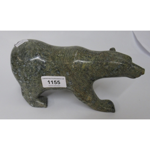 1155 - Tim Pee, inuit carved serpentine figure of a polar bear, 23 x 10.5cm