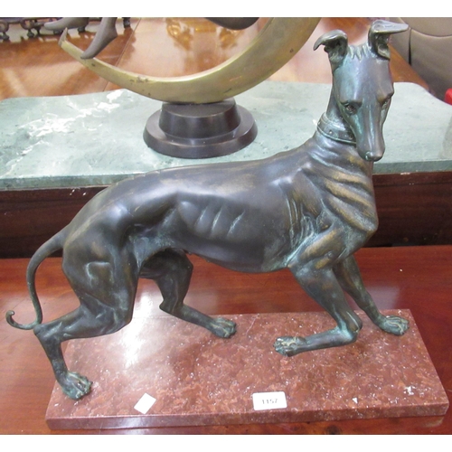 1157 - 20th Century dark patinated bronze figure of a greyhound on a veined rouge marble base, 43 x 47cm