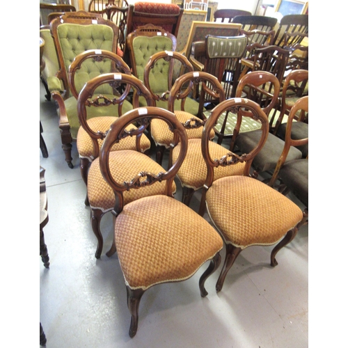 1176 - Set of six Victorian carved walnut balloon back dining chairs with carved and pierced centre rails, ... 