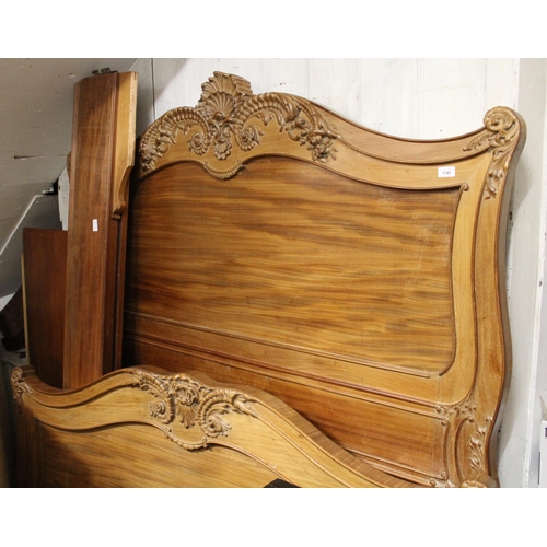 1181 - 19th Century French walnut king size bed having carved decoration and plain side rails, with base (a... 