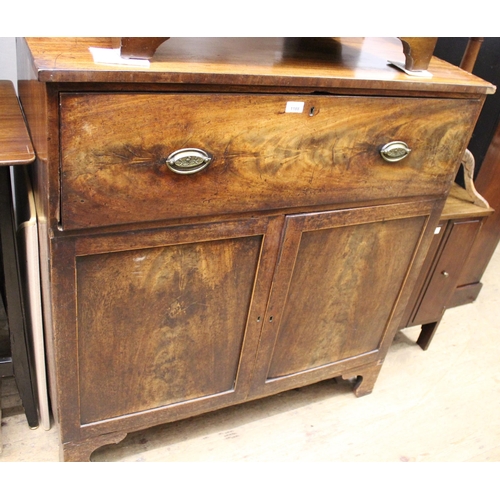 1188 - George III mahogany secretaire side cabinet, the fitted drawer with a fall front and oval brass hand... 