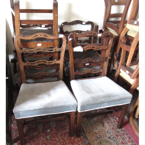 1193 - Set of six George III mahogany dining chairs, the pierced ladderbacks above stuffover seats and squa... 