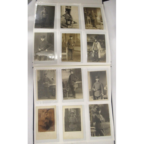 120 - Album containing a large quantity of German World War I military regimental postcards