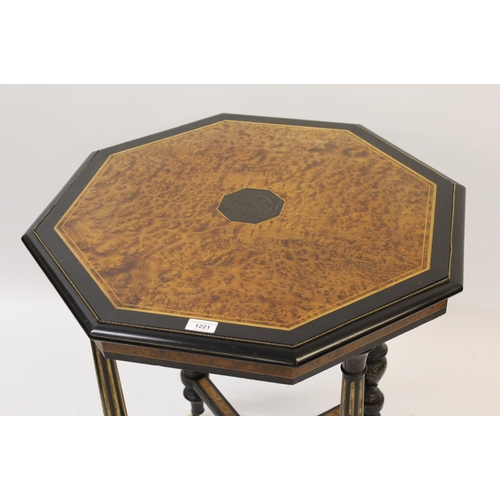 1221 - Edwards & Roberts amboyna ebonised and gilt metal mounted octagonal occasional table, on tapering fl... 