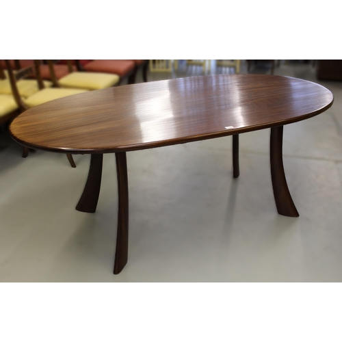 1222 - Mid 20th Century mahogany oval dining table on stylised outswept supports, 180 x 100cm approximately