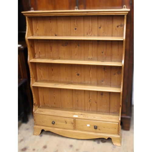 1231 - Small 19th Century stripped pine waterfall bookcase with two drawers, 82cm wide