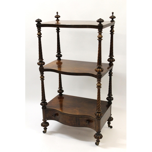 1233 - Victorian rosewood three tier whatnot on spiral turned supports with a single drawer, 58cm wide