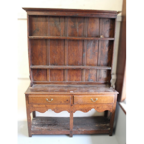 Small 19th Century oak plank top dresser with shelved back, having two short drawers with undertier, 190cm high x 136cm wide x 41cm deep