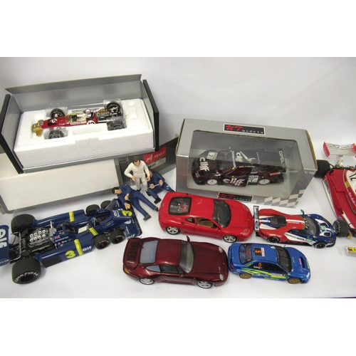 127 - Two mint boxed 1/18th scale die cast metal model racing cars of Lotus 49B by A Model and UT models o... 