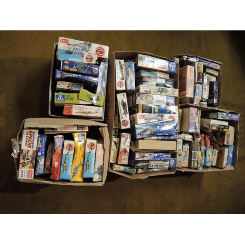 130 - Five boxes containing a large quantity of boxed and bagged model aircraft kits, including Airfix, Co... 