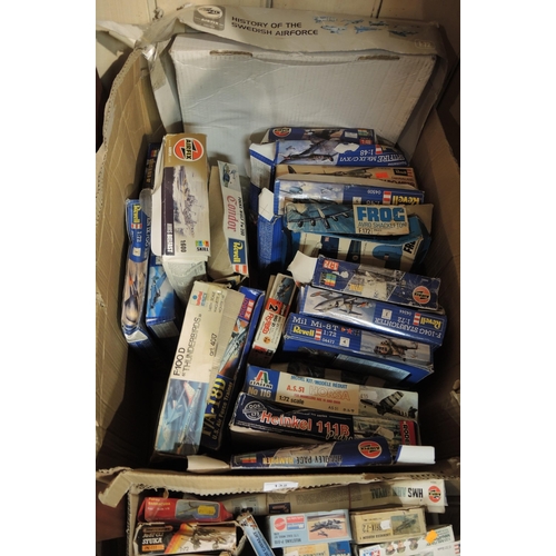 132 - Four boxes containing a large quantity of various boxed and bagged of model aircraft kits, including... 