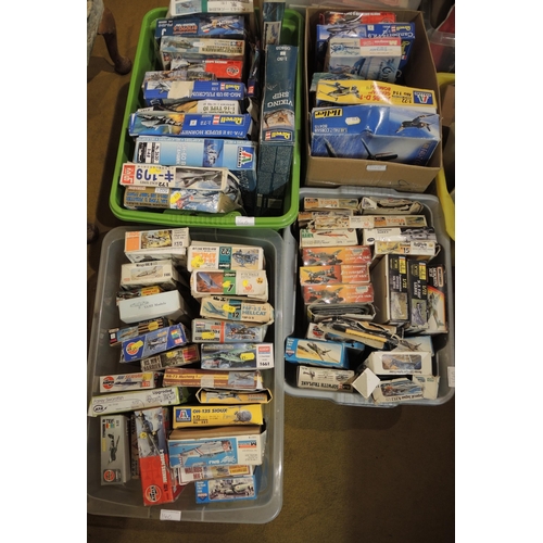 140 - Seven boxes containing a large quantity of various model aircraft kits including Airfix, Frog, Revel... 