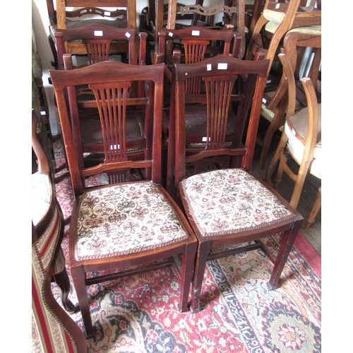 1438 - Early 20th century oval mahogany extending dining table, raised on turned fluted supports, together ... 