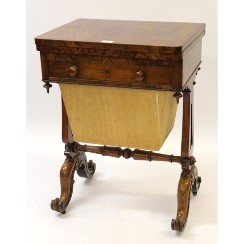 1439 - Victorian figured walnut games / work table, the swivel top inlaid with a chess board above a fitted... 