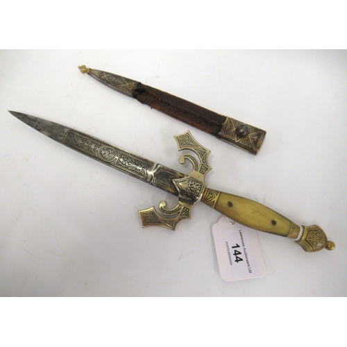 Islamic style Spanish dagger with horn handle and leather scabbard, the ...