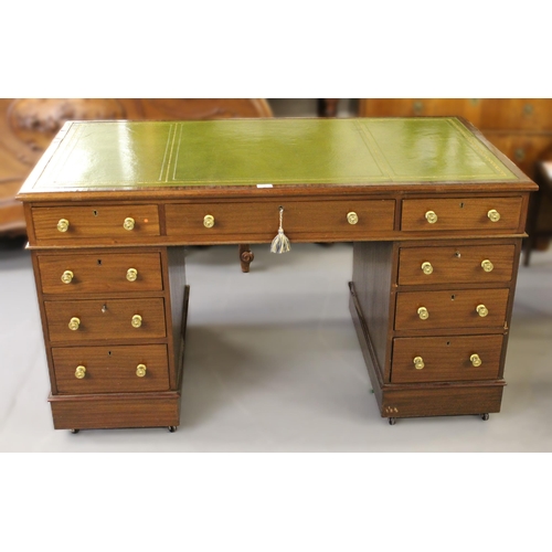 1441 - 19th Century mahogany twin pedestal desk, with a green tooled leather inset top, above nine pedestal... 