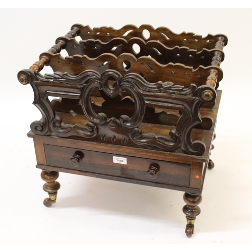 1446 - Victorian rosewood three division Canterbury, with pierced sides above a single drawer