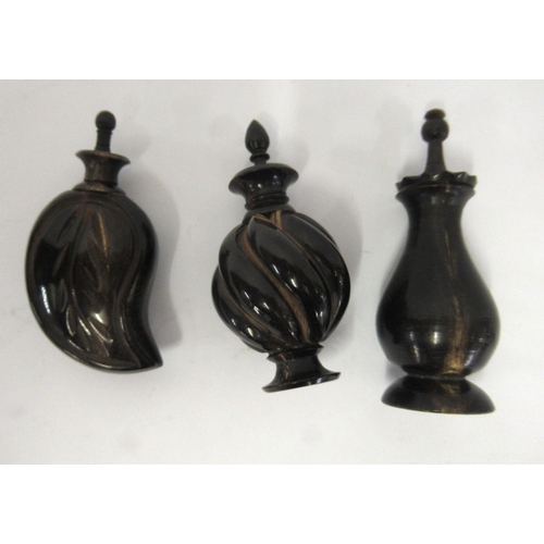 145 - Group of three small carved horn scent bottles