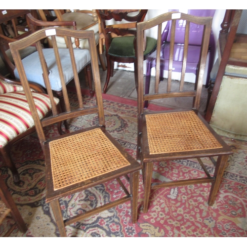 1476 - Set of four 19th Century mahogany railback dining chairs with overstuffed seats, on turned tapering ... 