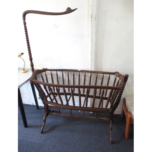 1487 - Child's 19th Century Continental rocking crib with bobbin turned decoration, together with late Vict... 