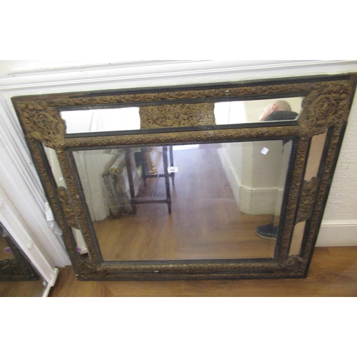 1494 - 19th Century Continental rectangular cushion wall mirror, with ripple moulded and impressed brass mo... 