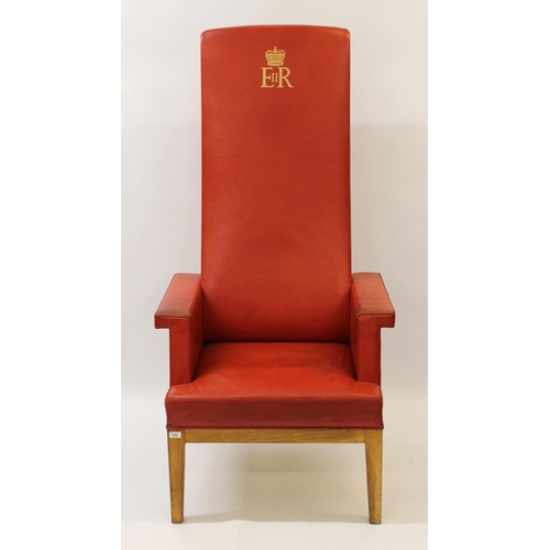 1500 - 20th Century high back red leather upholstered Judges chair with ER cypher to top on oak square tape... 