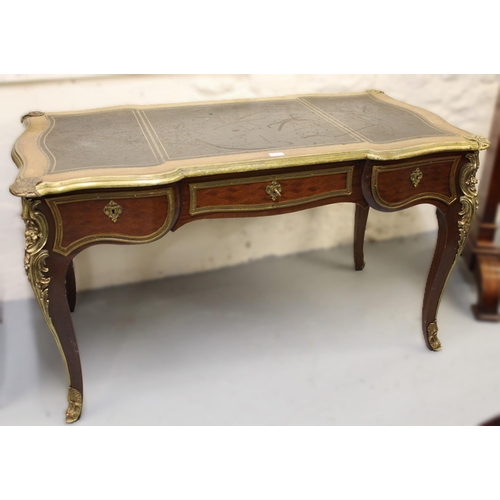 1502 - 20th Century Louis XV style writing table, having black leather gilt tooled inset top with ormolu mo... 