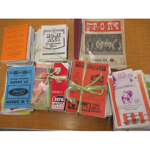 151 - Approximately four hundred home and away programmes, Workington AFC together with a 1949 bound copy ... 