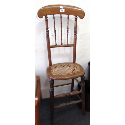 1510 - 19th Century beechwood correction chair with spindle back and cane seat, together with an oak four s... 