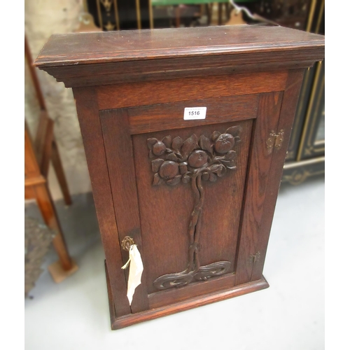 1516 - Early 20th Century Art Nouveau style oak wall cupboard, the single door having carved fruiting tree ... 