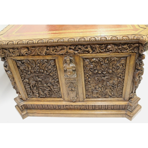 1522 - Fine oak twin pedestal partner's desk, the shaped red tooled leather inset top above shallow frieze ... 