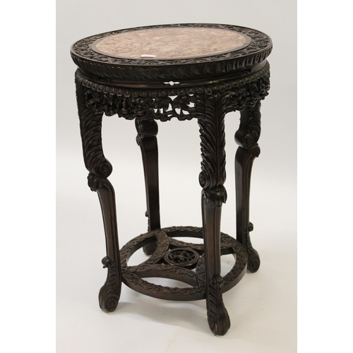 1526 - Large 19th Century Chinese carved hardwood vase stand, the circular rouge marble inset top above a p... 