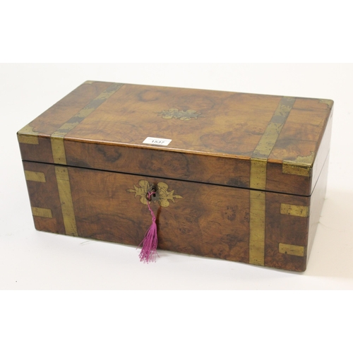 1537 - Victorian figured walnut brass bound fold-over writing slope, with fitted interior