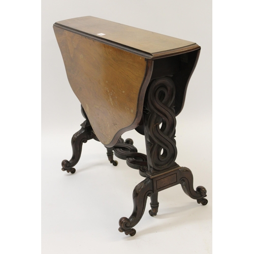 1543 - 19th Century walnut Sutherland table having wavy top above carved pierced end supports, with cabriol... 