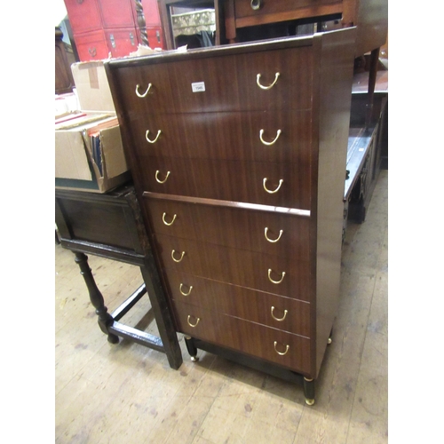 1545 - Mid 20th Century G Plan teak chest of seven drawers with gilt brass handles