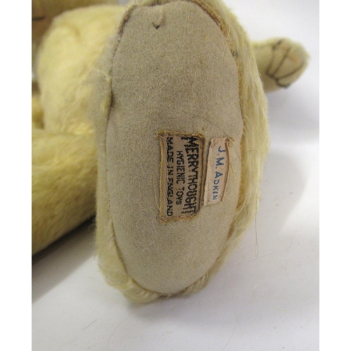 177 - Antique Merrythought articulated plush teddy bear bearing original label, 64cm high (worn)