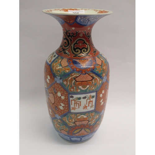 296 - Imari vase with flared rim and baluster body decorated with an all-over design in shades of iron red... 