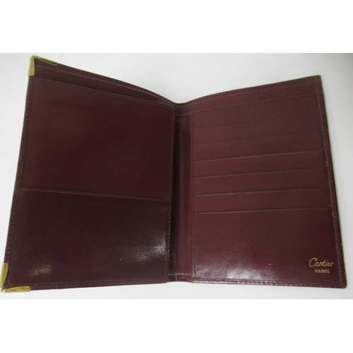 30E - Must de Cartier, burgundy leather wallet and another burgundy wallet