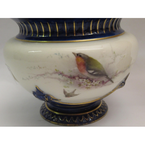 343 - Royal Worcester blush ivory pedestal bowl in the form of a shell with ivory ground and gilt highligh... 