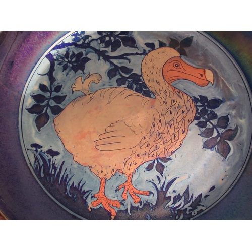 376 - Jonathan Chiswell Jones, large lustre charger decorated with a dodo, signed, 39cm diameter