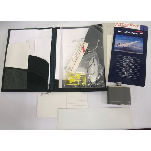 64 - Green Concorde folio containing a collection of various Concorde ephemera and collectables including... 