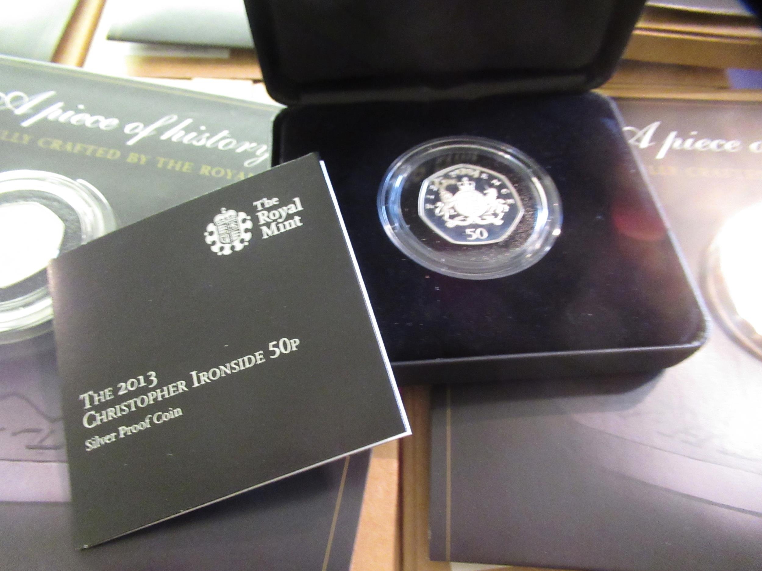 Christopher Ironside, silver proof fifty pence coin, together with six ...