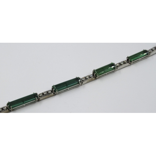 678 - 18ct white gold bracelet set with tourmaline and diamonds, 18cm long