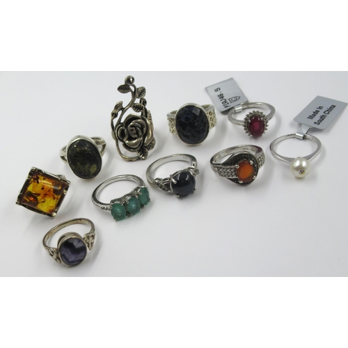 689 - Group of ten various silver mounted semi-precious stone and other pendants