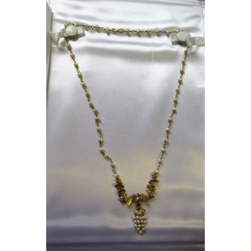 9ct Gold necklet set seed pearls in the form of a grape vine, gross ...