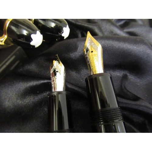 94A - Montblanc No. 149, two fountain pen set, one with an 18ct gold nib, the other with a 14ct gold nib