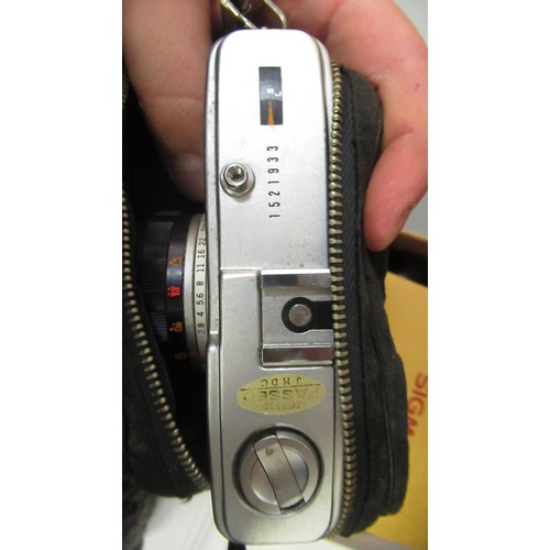 150 - Zenith Lomo camera, Olympus Trip 35 camera and a Pentax M250 camera, together with various lenses an... 