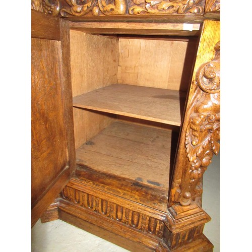 1522 - Fine oak twin pedestal partner's desk, the shaped red tooled leather inset top above shallow frieze ... 