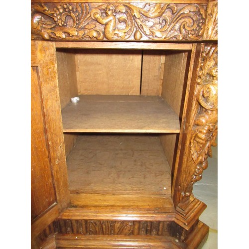 1522 - Fine oak twin pedestal partner's desk, the shaped red tooled leather inset top above shallow frieze ... 